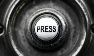 a button with the word press on it