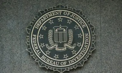 the seal of the department of justice on a wall
