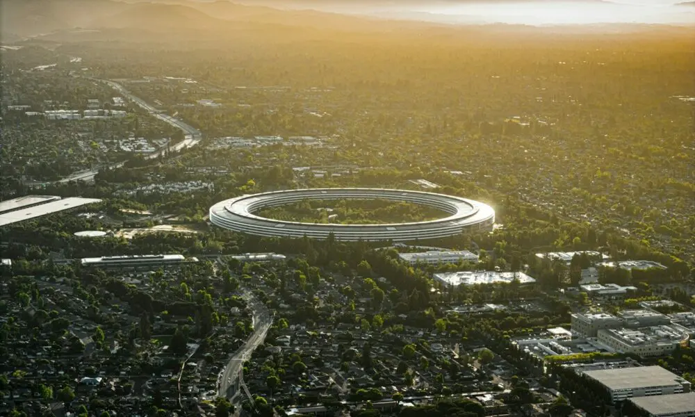 An aerial view of a city with a circular building