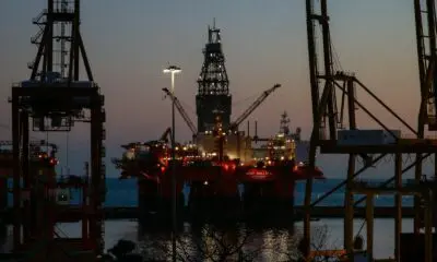 The West Bollsta semi-submersible drilling rig docked in a harbor at low light