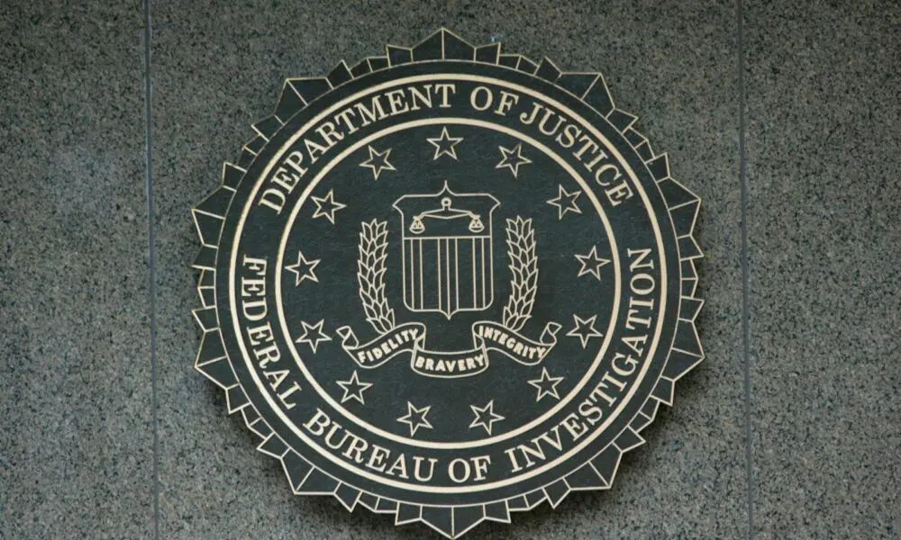 the seal of the department of justice on a wall