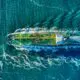 aerial view of white and yellow boat on body of water during daytime