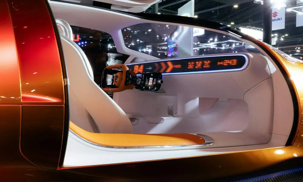 The interior of a futuristic car is shown
