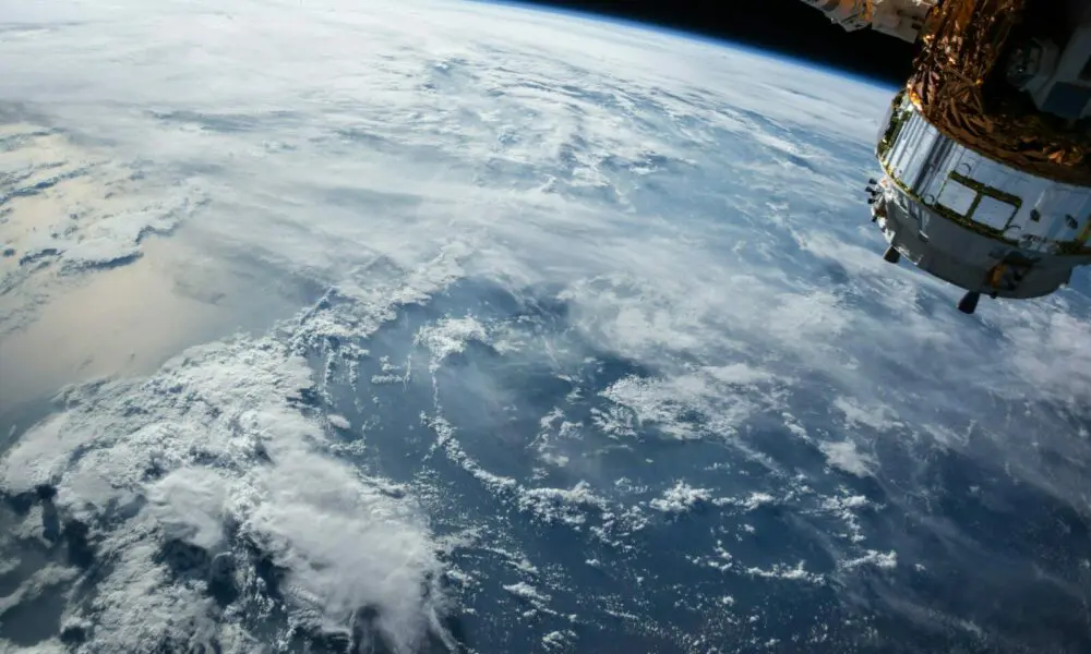 view of Earth and satellite